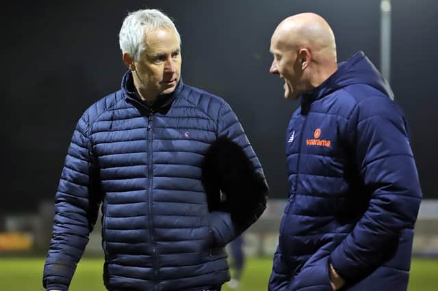 New Kettering Town manager Ian Culverhouse and assistant Paul Bastock talk things over after the final whistle. Pictures by Peter Short
