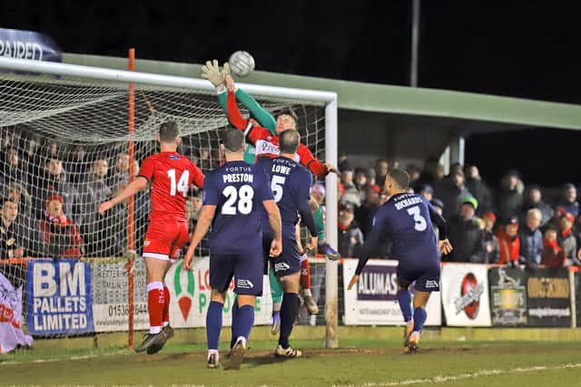 Jordon Crawford's late effort was ruled out for this incident involving Connor Kennedy, who was penalised for handball