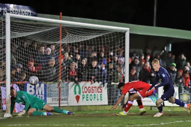 Kidderminster goalkeeper Luke Simpson made a superb late save to deny Decarrey Sheriff