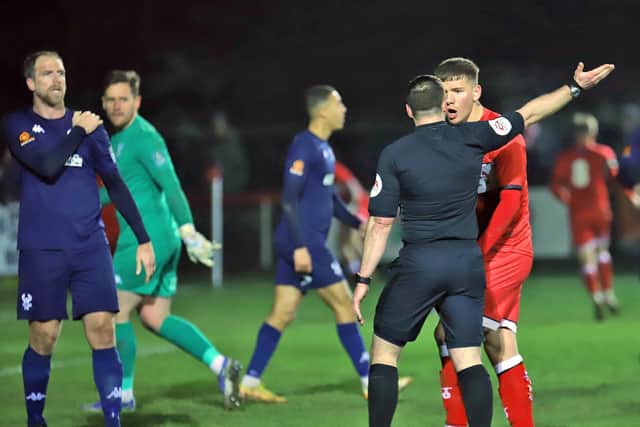 The Poppies protest after Jordon Crawford's late effort was ruled out by referee Greg Rollason