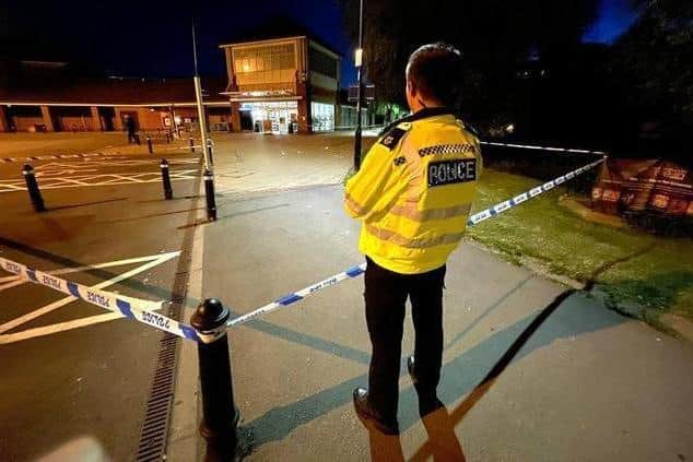 Police guarding the scene last year. Picture: Andrew Carpenter