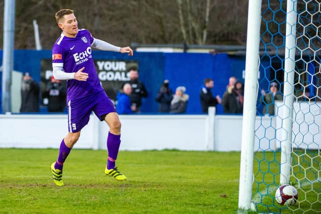 Elliot Sandy scores Corby Town's second goal in their narrow 3-2 defeat at high-flying Chasetown last weekend. Picture by Jim Darrah