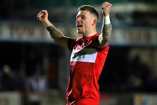Jordon Crawford shows his delight following the Poppies' midweek success