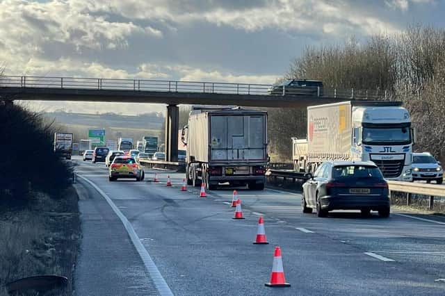 A lane was closed on the A14 yesterday following a collision between a lorry and car.