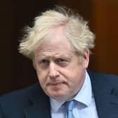 PM Boris Johnson leaves Downing Street before Wednesday's PMQs