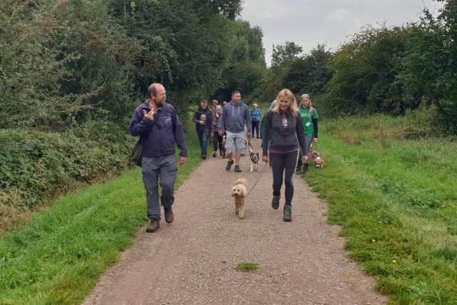 A group dog walk at Stanwick Lakes