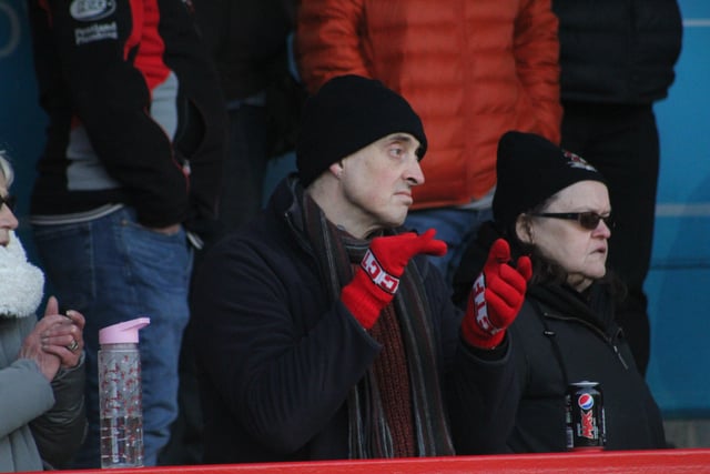 Reds fans watch on. Crawley Town v Hartlepool United. Picture by Cory Pickford SUS-221202-205611004