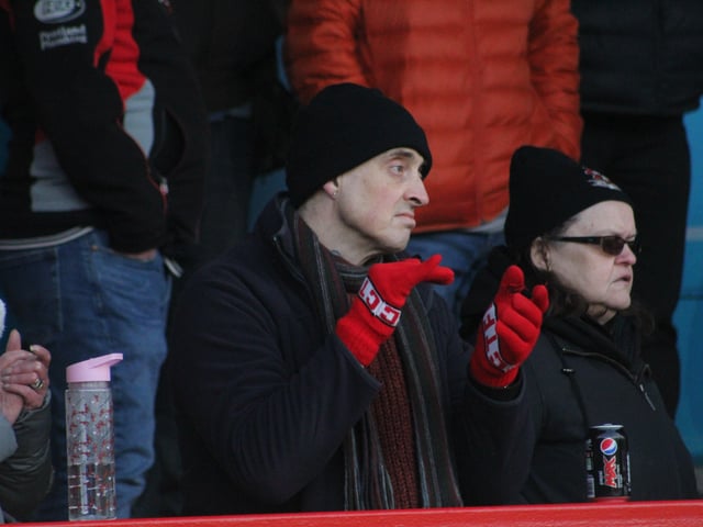 Reds fans watch on. Crawley Town v Hartlepool United. Picture by Cory Pickford SUS-221202-205611004