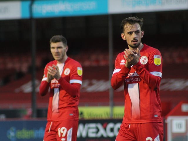 Jack Powell and Jordan Tunnicliffe at the end of the game. Crawley Town v Hartlepool United. Picture by Cory Pickford SUS-221202-205858004