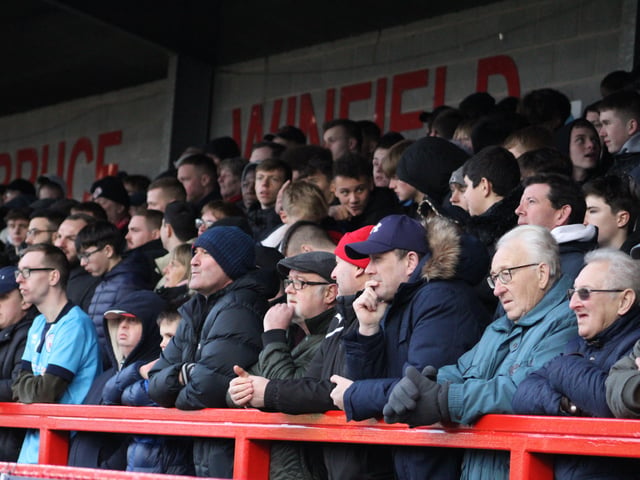 Reds fans watch on. Crawley Town v Hartlepool United. Picture by Cory Pickford SUS-221202-205549004