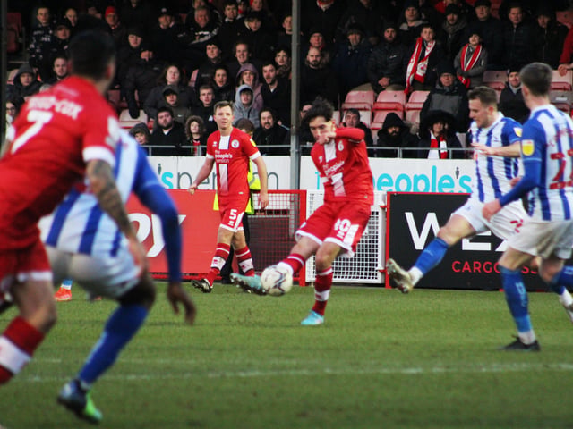 Isaac Hutchinson on the ball. Crawley Town v Hartlepool United. Picture by Cory Pickford SUS-221202-205828004
