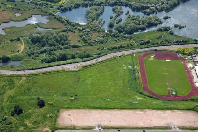 Land including green space and a former running track could be sold to Cobblers owners