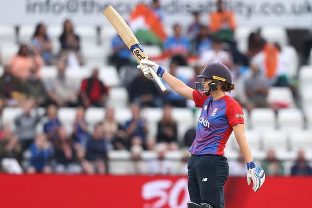 England's Natalie Sciver celebrates reaching 50 in England's T20 win over India last July
