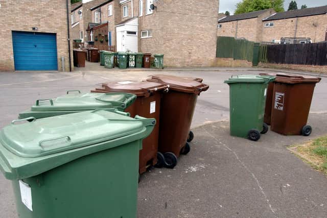 Corby's green 'green' waste bin collections currently run all year except Christmas week - and are free