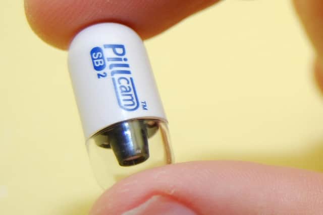 The 'Pillcam' is only slightly larger than a regular pain relief tablet.