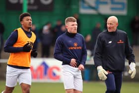 Assistant-manager Paul Bastock pictured alongside Jordon Crawford and Decarrey Sheriff ahead of Kettering Town's 2-1 victory at Blyth Spartans last weekend. Picture by Peter Short
