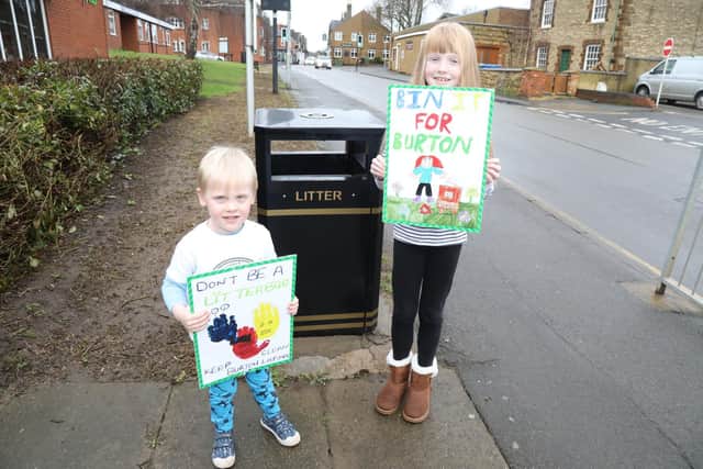 Harry Balmbra, 3, and Zoe Simmonds, 9, with their winning designs