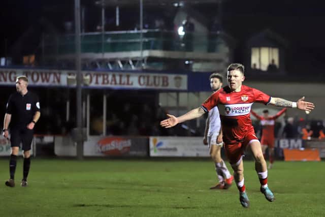 Jordon Crawford celebrates after he completed the comeback with a thunderous finish