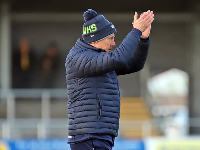 Ian Culverhouse applauds the travelling fans after Kettering Town's 3-2 defeat at Boston United last weekend. Picture by Peter Short