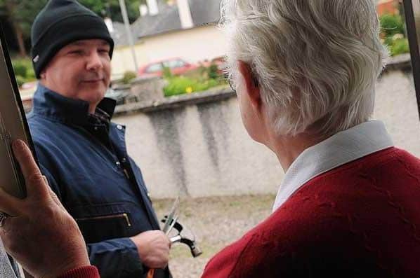 Police are urging people to beware rogue traders calling unannounced after a Northampton couple were scammed out of £100,000. (File picture using posed models).