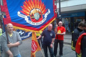 Thom Stitt (centre) is dedicate 40 years of his life to public service. Photo: FBU.