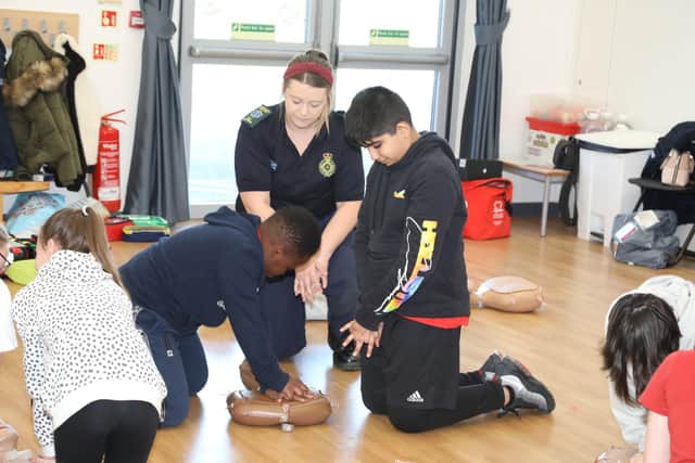 Corby Primary Academy pupils practice CPR