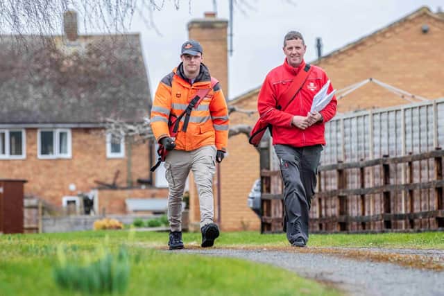 Postman Pete is often accompanied by Khiel Rennie, 20, on his rounds. Photo by Kirsty Edmonds.