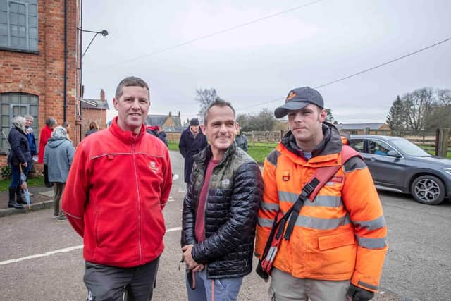 Postman Pete with Ward Rennie and Khiel Rennie. Photo by Kirsty Edmonds.