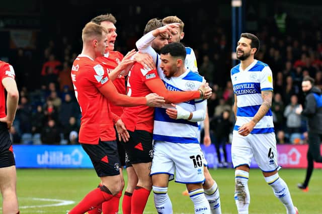Luton players react to Ilias Chair's shove on Tom Lockyer during the 2-1 defeat against QPR on Sunday