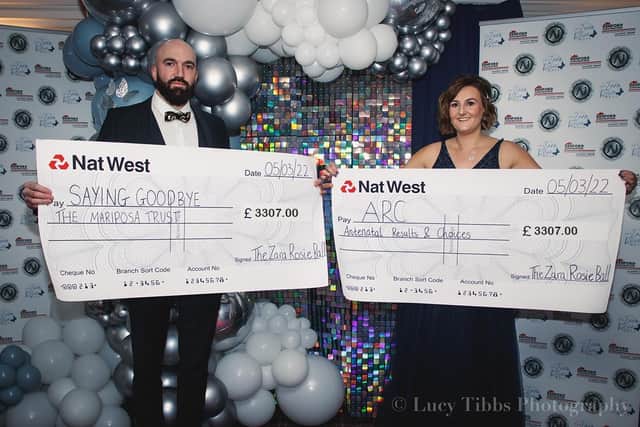 Steven and Emma with their fundraising cheques. Credit: Lucy Tibbs Photography.