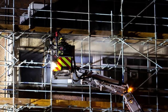 Firefighters used a high-level platform to tackle flames on the fourth floor