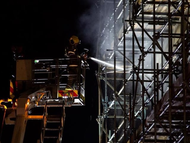 Smoke billowed from the top floor of the iconic building which fronts on to Drapery