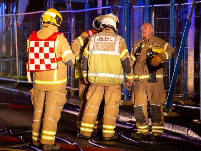 Northamptonshire Fire & Rescue' incident commander is briefed on the situation