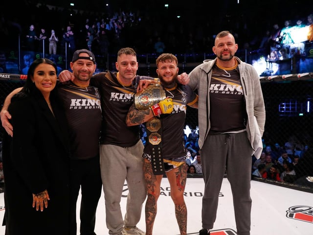 Jordan Vucenic and his team pose for the camera after his title defence