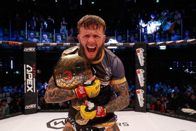Jordan Vucenic shows his delight after he defended his Cage Warriors featherweight title. Pictures by Dolly Clew (www.dollyclew.com)
