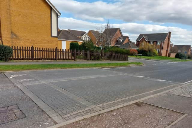 The Lake Avenue speed hump, near Moorhouse Way.