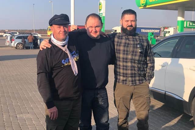 Wayne Davis (on left) with friends he made en route