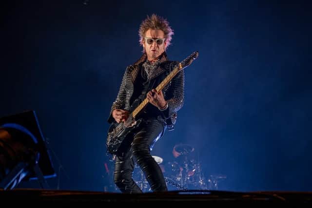 Daniel Ash on stage at London's Alexandra Palace in 2021. Photo by David Jackson.