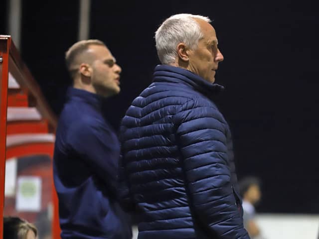 Manager Ian Culverhouse and coach Joe Simpson (in the background) will urge Kettering Town to 'attack' all of their remaining matches. Picture by Peter Short