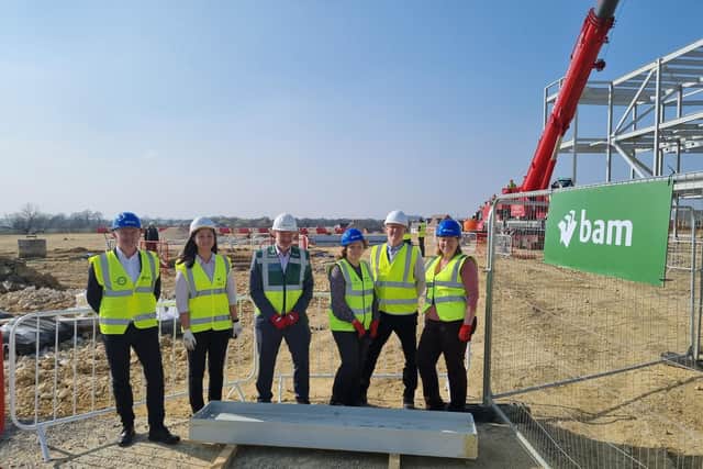 Pictured, from left, are BAM Design's project architect alongside; Bonnie Leung, senior structural engineer for Mott Macdonald; David Barr, BAM Construction manager; executive principal Sarah Wilson; Paul Palmer, ICT advisor at the Department for Education; and Cllr Angela Page of Weldon Parish Council