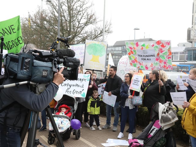 TV crews film the protest