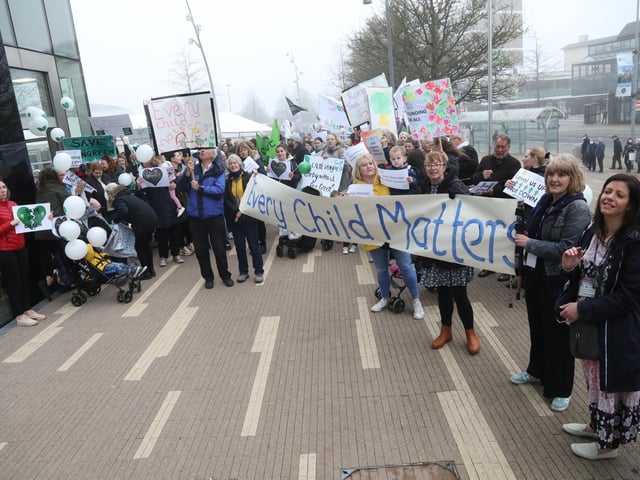 Staff and supporter of Highfield and Croyland Nursery in Wellingborough and Ronald Tree in Kettering joined those from Pen Green Nursery in Corby outside the Corby Cube
