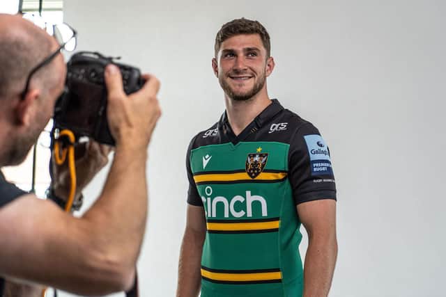James Grayson modelling Saints' new home kit