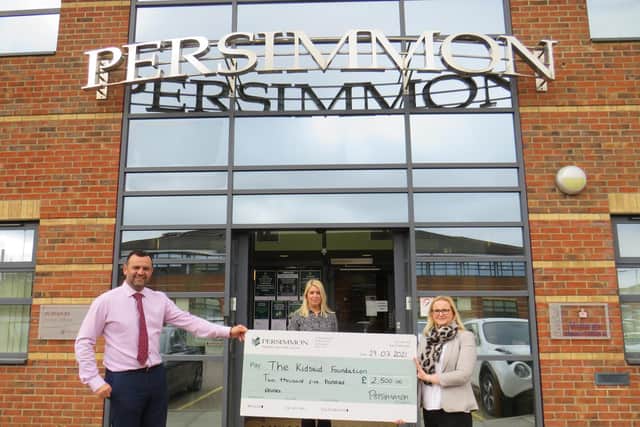 Persimmon Homes regional divisional director, Simon McDonald and sales director, Claire Dearsley with Tessa Taylor from the KidsAid Foundation