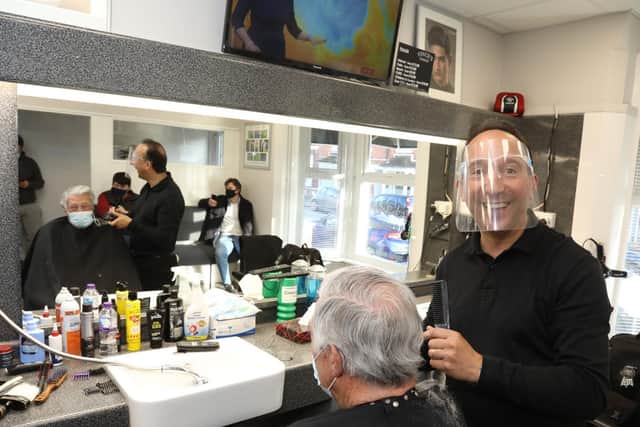 Vince Geriano with customer Ron Mathiesen