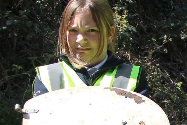 Junior Cadet Summer is not impressed with find an abandoned toilet seat