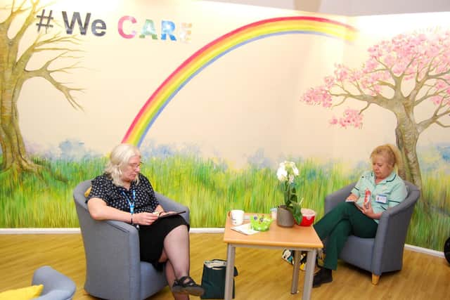 Staff enjoying the We Care café which has been supported with funding from NHS
Charities Together.