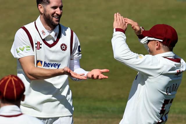 Wayne Parnell celebrates after claiming his first wicket for Northants, Glamorgan opener David Lloyd