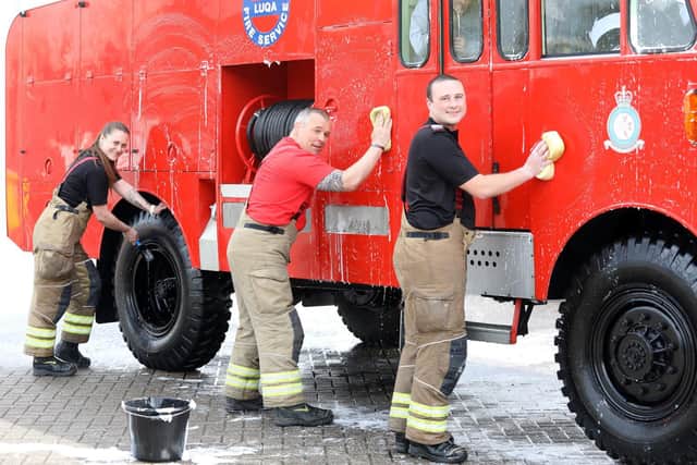 Corby, firefighters charity car wash 
Mel Barker (firefighter), Craig Douglas (watch commander for the red watch crew at Corby Fire Station), Adam O'Brien (crew commander)
Saturday, April 24th 2021