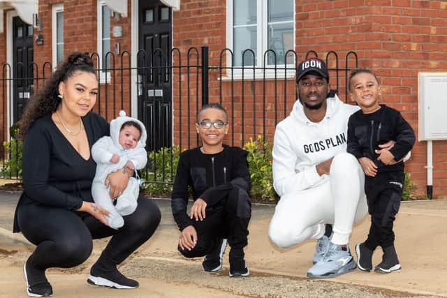 Jade and Ravaun Jones, with their three sons Taylan, J’Karne and Zyan